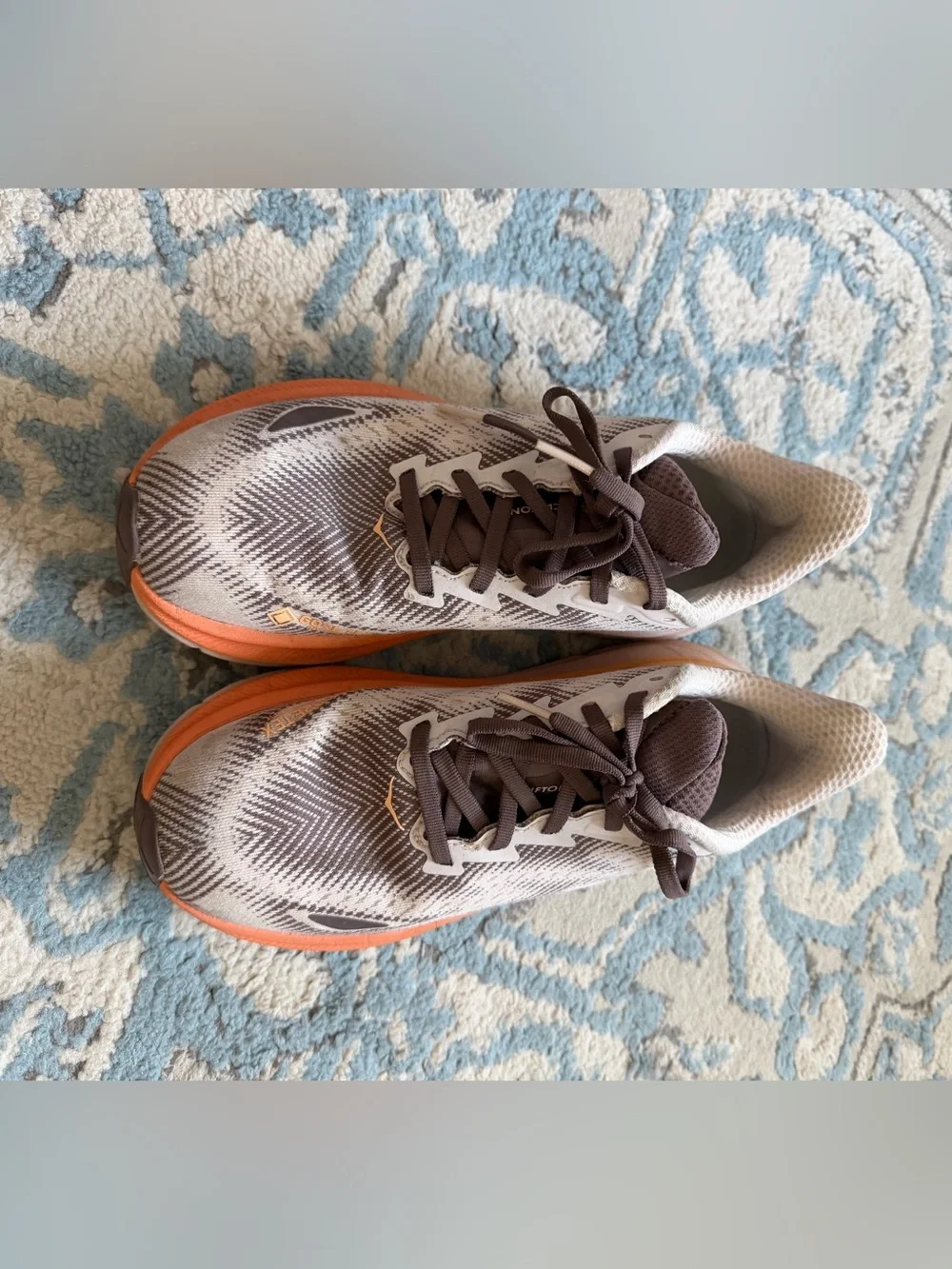Hoka Women's Clifton Running Shoes in Brown and Orange